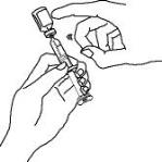 7.	Continue to hold the barrel of the syringe.  With your free hand, twist the 25 gauge needle onto the tip of the syringe until it fits snugly.  Place the syringe on your flat work surface.