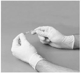 Remove the protective covering from one end of the double-ended transfer needle.