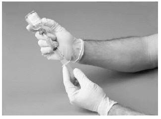 Withdraw the solution into the syringe.